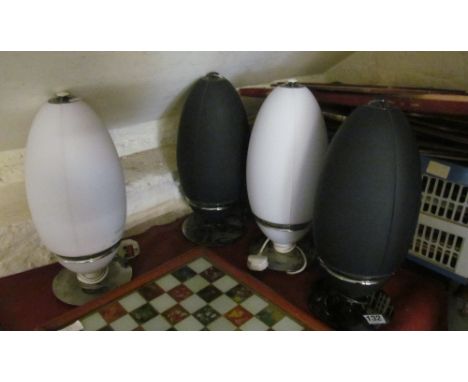Four Samsung bullet shaped speaker cordless; two black and two white