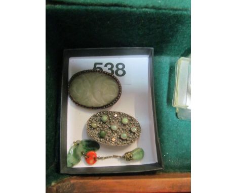 A 9ct gold Chinese jade and coral pendant and two jade brooches stamped China