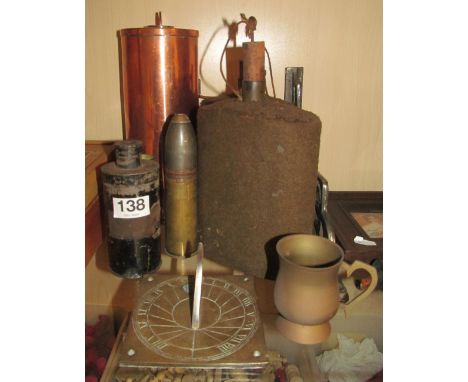 A copper trench art lidded flask, few other pieces trench art, wall bracket and sundial