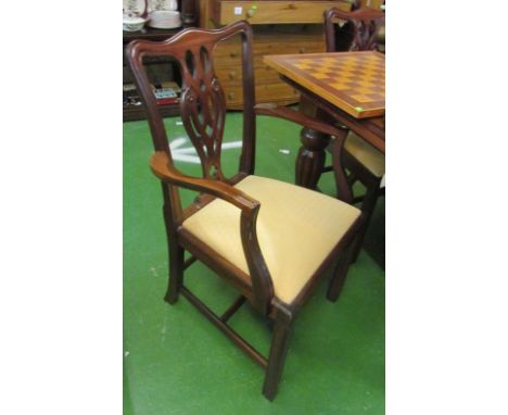 A set of eight Chippendale style chairs