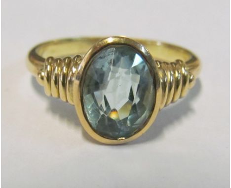 An 18ct gold aquamarine ring, size Q/R 5g