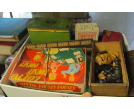 Various packs of playing cards, two cribbage boards, part chess set, other games and a Nobility Solid State radio (boxed)