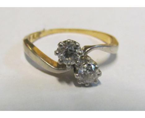 An 18ct gold and platinum diamond ring, size K 2.5g