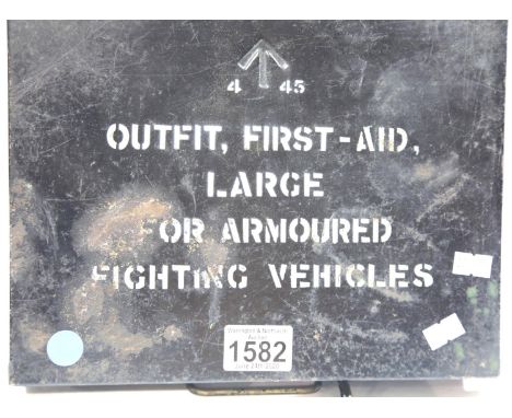 British WWII style first aid outfit tin, the hinged cover having broad arrow impressed and white stenciled writing, dating to