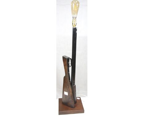 Early 20th century double barrel shotgun, later converted to a table lamp, H: 71 cm. P&amp;P Group 3 (£25+VAT for the first l