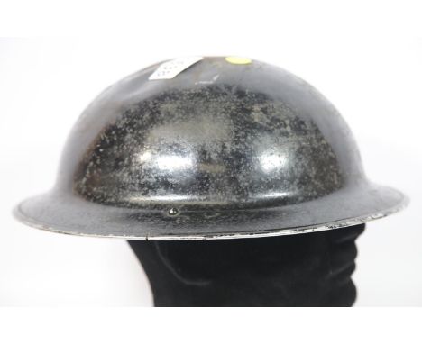 WWII British helmet lacking liner. Stamped 121 and 10/1939. P&amp;P Group 2 (£18+VAT for the first lot and £2+VAT for subsequ