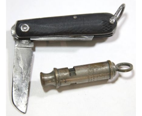 British WWII style ARP whistle and a folding knife with tin opener, the blade marked with broad arrow and dated 1943. P&amp;P