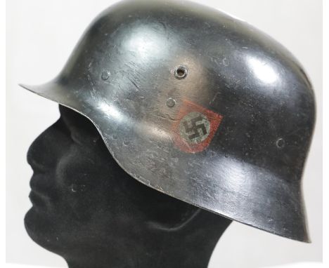German WWII style SS raw edged steel helmet with liner. P&amp;P Group 2 (£18+VAT for the first lot and £2+VAT for subsequent 