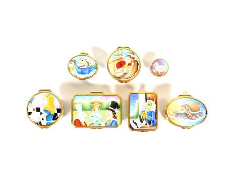 Seven Elliott Hall enamel trinket boxes, various shapes, six decorated with scenes from Alice in Wonderland, the smallest box