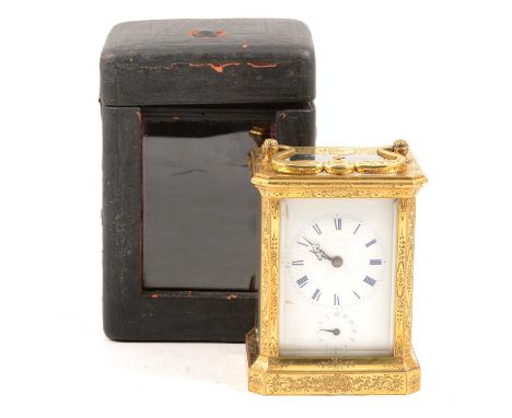 Dent a Paris, a French brass carriage clock, engraved case, the rear door with dust covers, rectangular enamelled dial with R