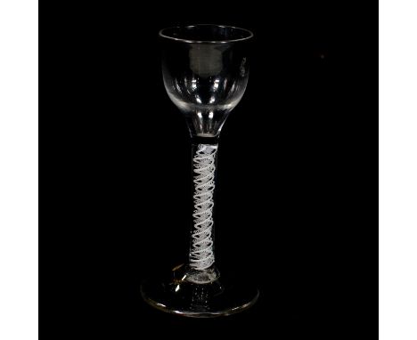 Wine glass, ogee bowl, double series opaque twist stem with a corkscrew gauge and twin tapes, conical foot, 15cm.Condition re