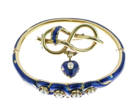Mid Victorian pearl and enamel hinged bangle, the four pearls (untested and unwarranted) claw set to a royal blue enamel grou
