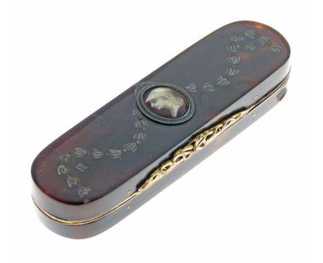 George III tortoiseshell toothpick case, the hinged cover having silver bell husk swag inlay and central oval profile portrai