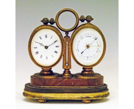 Victorian lacquered brass cased combined desk clock and barometer, standing a serpentine base, 16.25cm high  Condition: Pleas