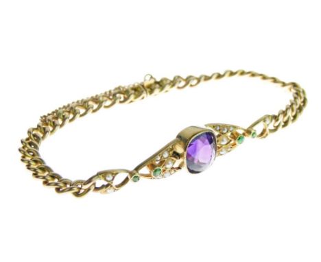 Edwardian amethyst, seed pearl and demantoid garnet bracelet, stamped '15', the stone set centre piece to hollow curb links, 