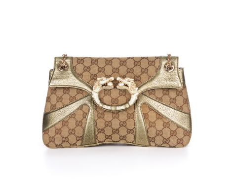 Gucci, a Tom Ford Jewelled Dragon handbag, designed with the maker's classic monogram canvas exterior with gold leather trim,
