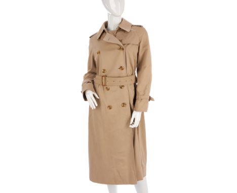 Burberry, a ladies classic trench coat, designed with a notched lapel collar, buttoned epaulettes, back yoke, double breasted