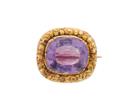 A late Georgian gold, cushion-shape amethyst brooch, with scrolling floral surround, amethyst estimated weight 7.50ct, length