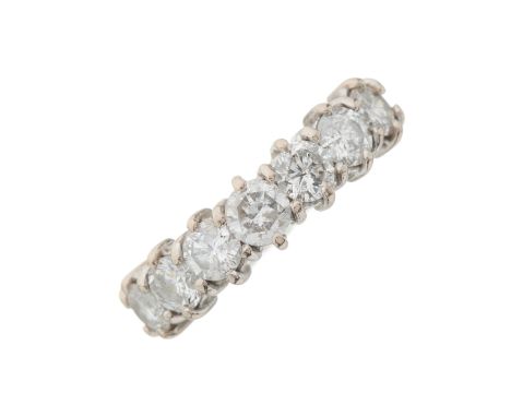 A mid 20th century 18ct gold brilliant-cut diamond half eternity ring, with tapered band, total diamond weight 1.49ct, engrav