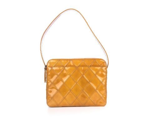 Chanel, a patent leather camera bag, featuring a diamond quilted patent leather exterior, with a front slip pocket, flat leat