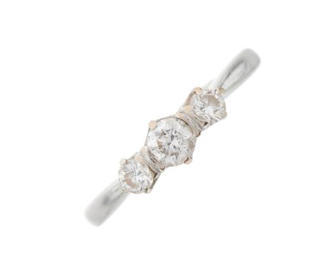 An 18ct gold brilliant-cut diamond three-stone ring, with tapered shoulders and band, estimated total diamond weight 0.50ct, 