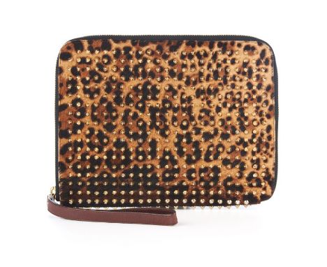 Christian Louboutin, a studded tablet case, designed with a leopard printed pony hair exterior with gold-tone studded details
