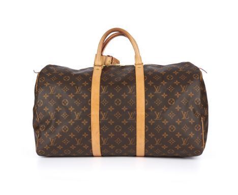 Louis Vuitton, a monogram Keepall 50 luggage bag, designed with tan leather trim, rolled leather top handles, gold-tone hardw