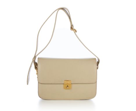 Celine, a vintage leather handbag, designed with a smooth cream leather exterior, with gold-tone hardware, adjustable leather