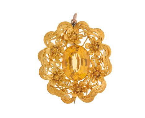 A late Victorian gold, oval-shape citrine pendant brooch, with openwork floral and foliate surround, citrine estimated weight