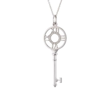 Tiffany & Co., an 18ct gold brilliant-cut diamond Atlas Key pendant, suspended from a trace-link chain, signed Atlas T&Co., e