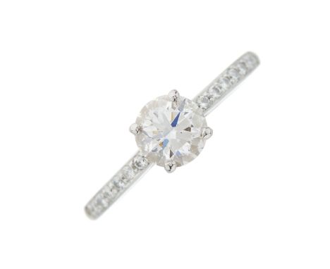 De Beers, a platinum brilliant-cut diamond single-stone ring, with similarly-cut diamond line shoulders, signed De Beers, ser