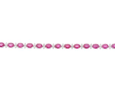 An 18ct gold oval-shape ruby line bracelet, with brilliant-cut diamond double spacers and partially concealed push-piece clas