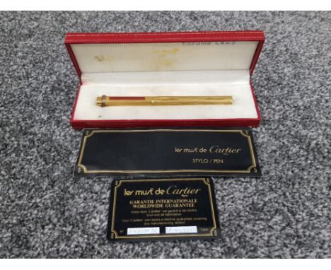 Cartier pen le must de Cartier ballpoint pen with red strips on the front in original box with original warranty card and mod