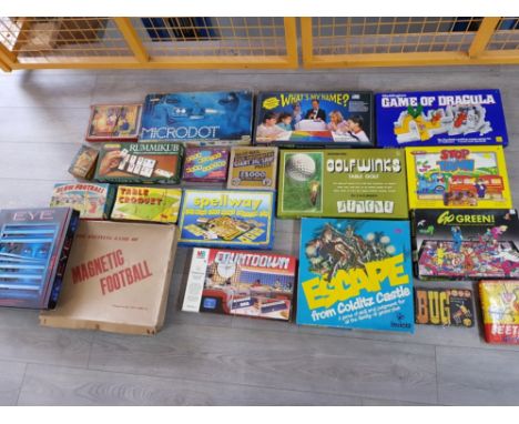 Box containing 20 vintage games including Escape from colditz castle, Magnetic football etc