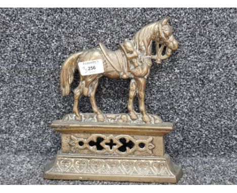 Vintage / antique brass door stop in the form of a saddled horse