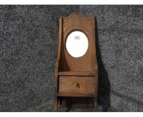 A Victorian carved wooden hall mirror with shelf and drawer 59cm high.