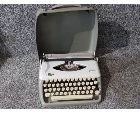 Vintage Adler Tippa 1 typewriter in carry case