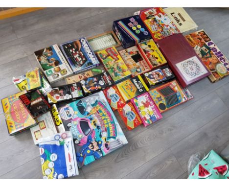 Box containing 24 miscellaneous vintage boardgames including Traffic Jam, blow football and Stanley Gibbons collect etc