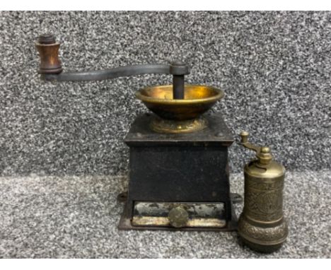 Cast Iron coffee grinder together with highly decorative Middle East pepper grinder