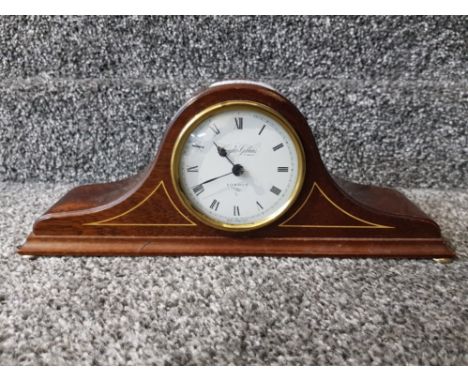 A small inlaid mahogany cased mantle clock by Knight &amp; Gibbins, London.