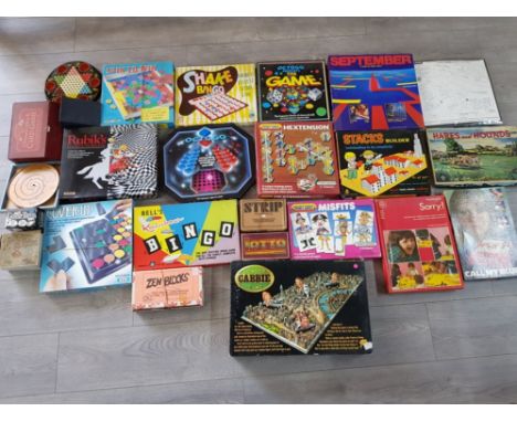 Box of vintage games, 22 in total including Rubiks illusion box set, London cabbie game etc