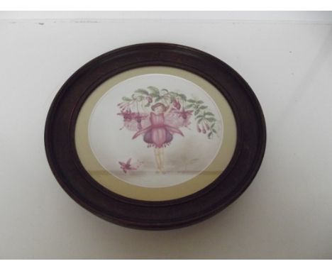 Framed ceramic plaque depicting Tinkerbell 