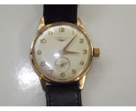 Longines 9ct gold cased wristwatch with second subdial. Manual wind. Circa 1970's 25 years inscription on the back case. The 