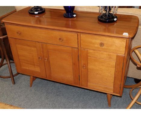 A 1970s Ercol elm sideboard with two drawers and three cupboard doors, 122cm wide 
