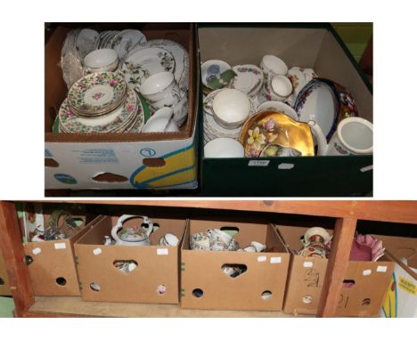 A large quantity of household ceramics and glass including: Staffordshire seated spaniels, Continental urns and covers, Japan