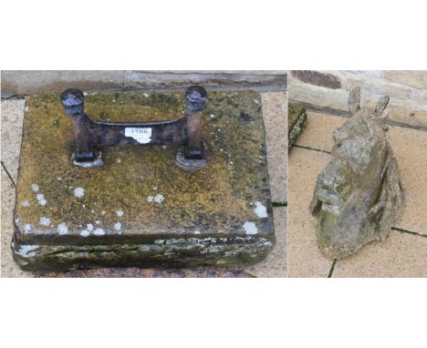 A cast iron boot scraper together with a composition horses head garden wall mount (2)