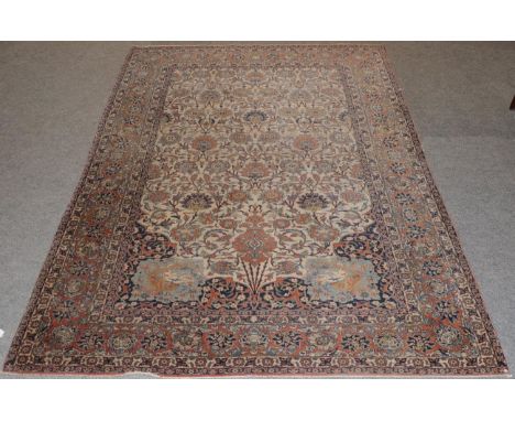 An unusual Isfahan prayer rug, the floral lattice field with hanging lamp, framed by pictorial spandrels and terracotta borde