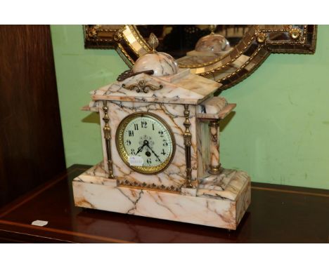 A Victorian blush marble mantel clock