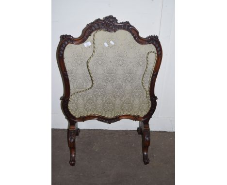 HEAVILY CARVED VICTORIAN FIRE SCREEN RAISED ON CHEVAL LEGS, WITH FLORAL DECORATED INSET, WIDTH APPROX 62CM