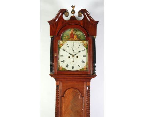 EARLY NINETEENTH CENTURY FIGURED MAHOGANY LONGCASE CLOCK, indistinctly signed, the 12" painted roman dial with subsidiary sec